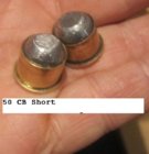 50 cb short with 50 cal Lead ball crushed over 1.1 gr Bullseye b 4-19-2012.jpg