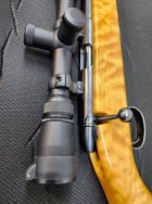 12 Caliber Rem 591 action pic.JPG