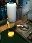 Omega trickler with bottle.jpg