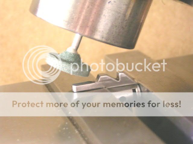 Cockingpiecegrindingcloseup.jpg